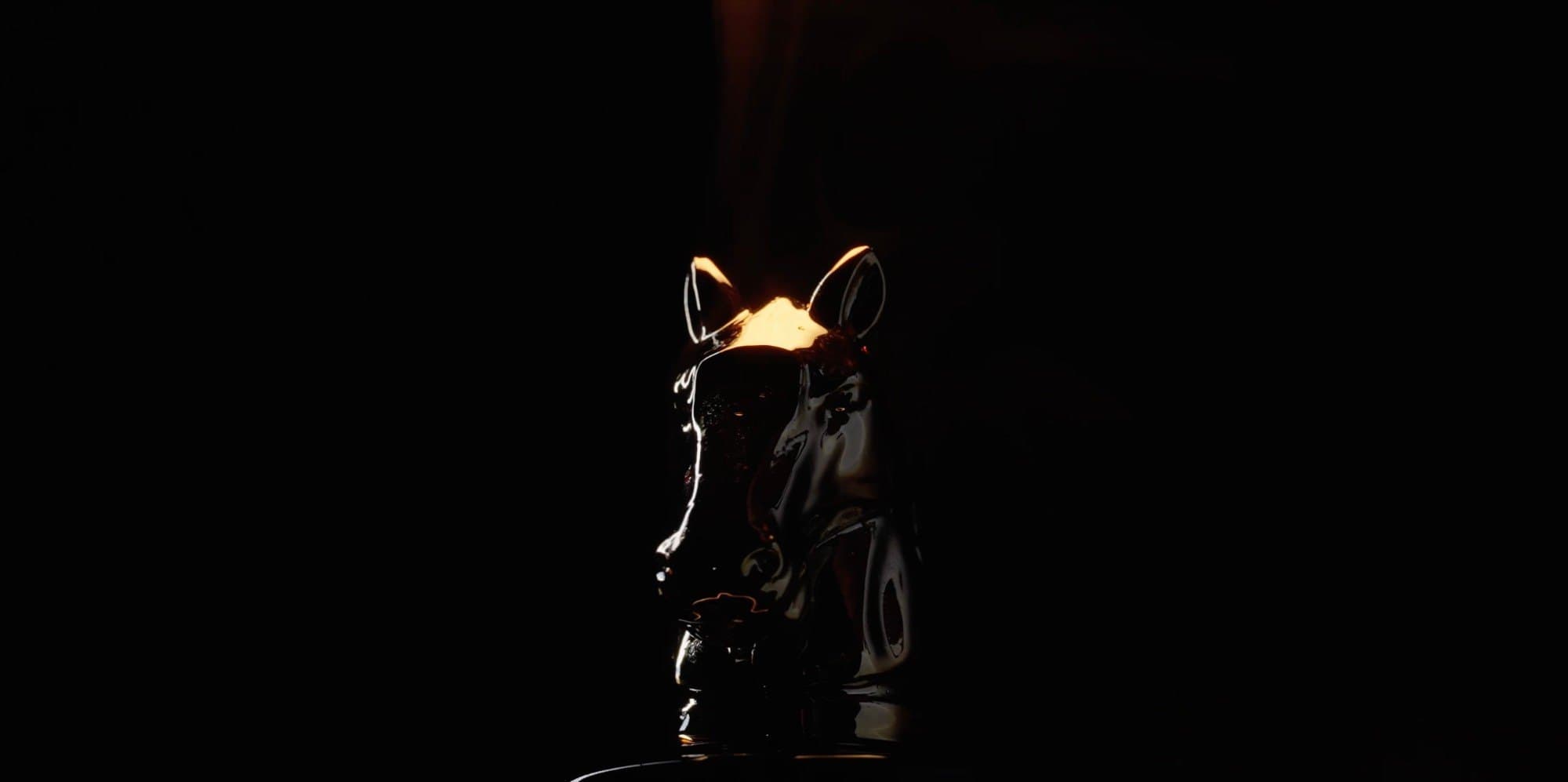 Fouz Perfume — horse-head bottle, jewelled caps and fire