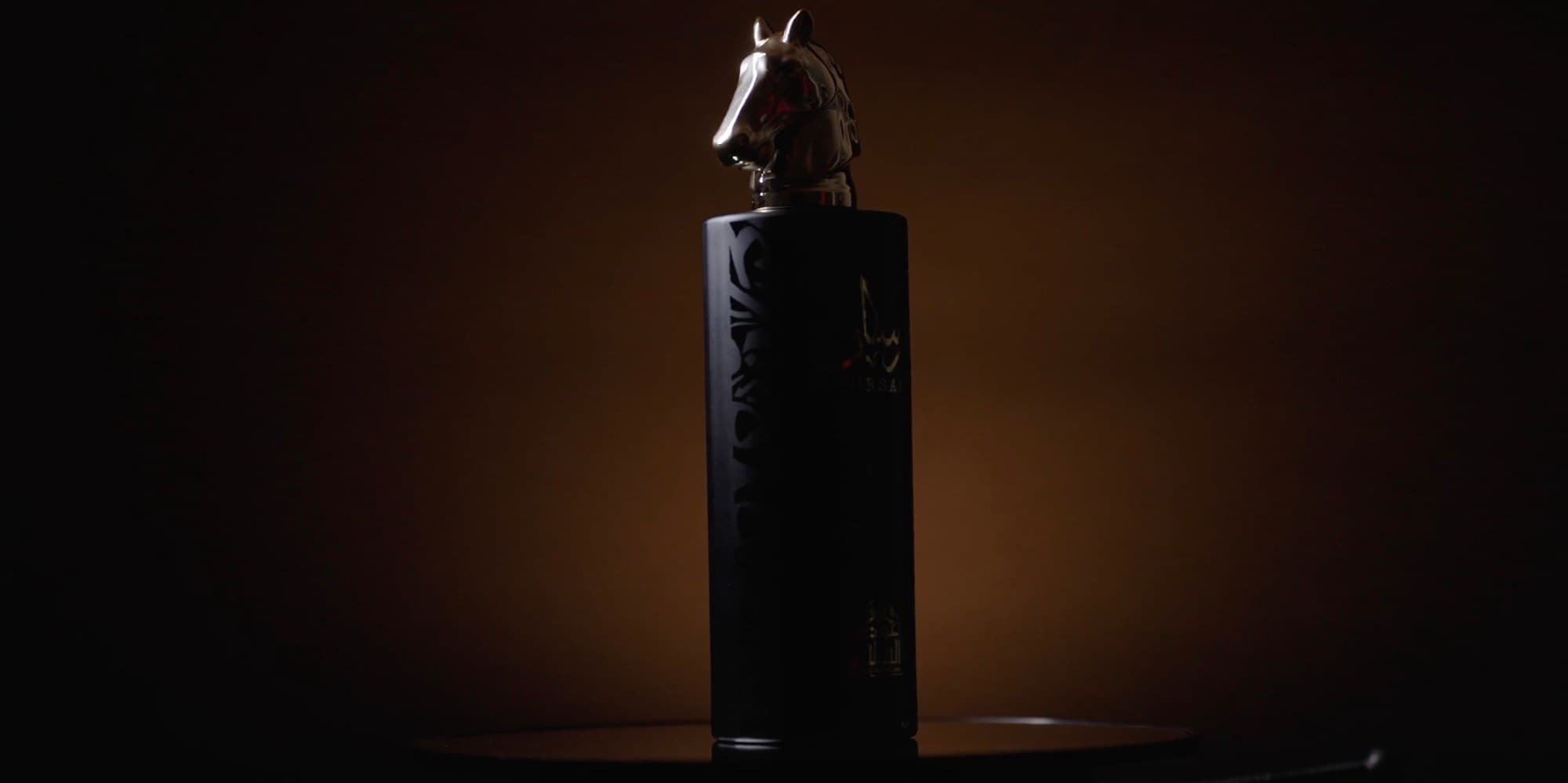 Fouz Perfume — horse-head bottle, jewelled caps and fire