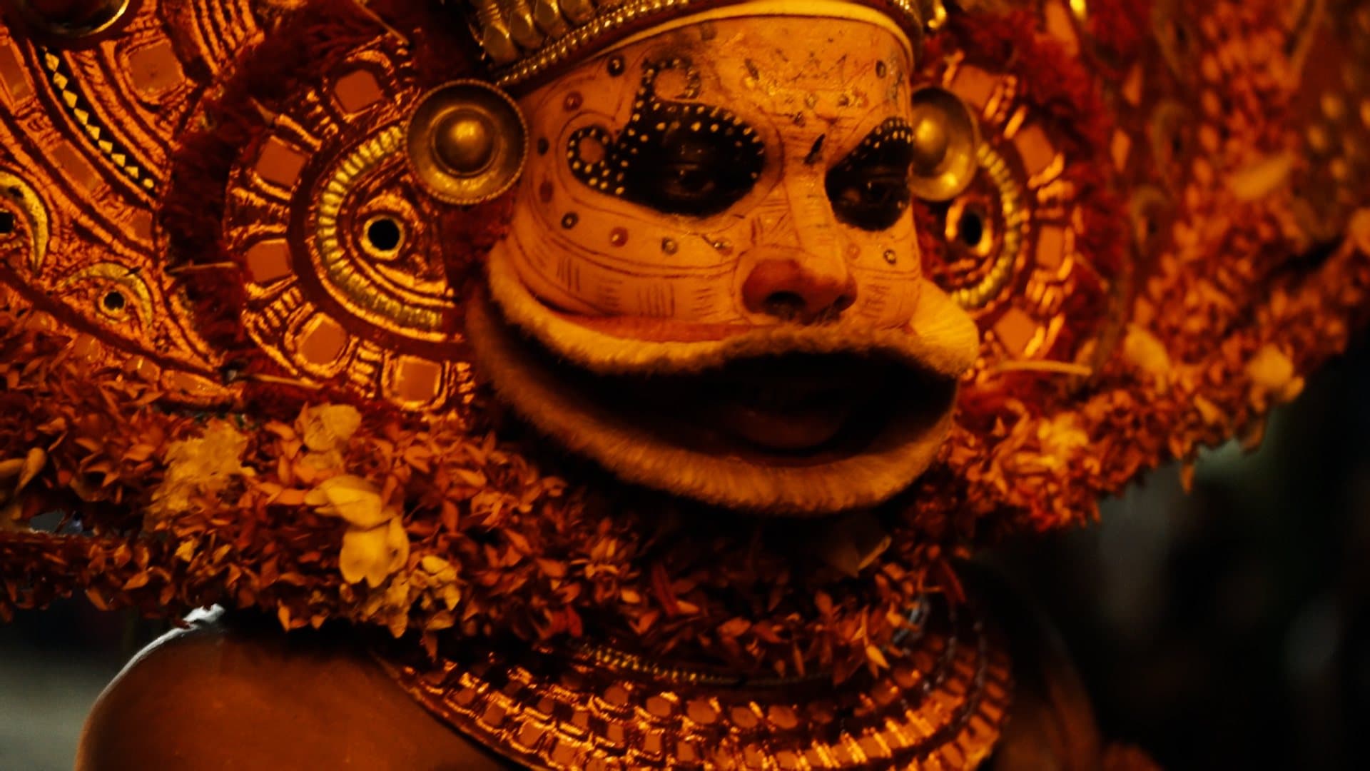 Theyyam — The painted face and headdress
